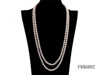 Two-strand 7-7.5mm white round freshwater pearl necklace with seashell clasp