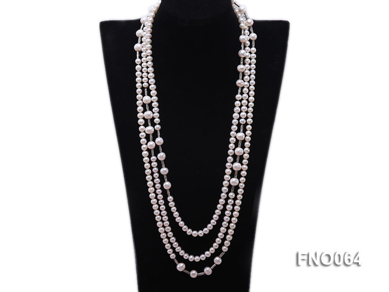 7-7.5mm white round pearls alternated 10-10.5mm white pearls and white gilded tube necklace
