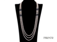5-8mm white and black flat freshwater pearl multi-strand opera necklace