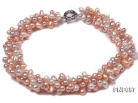 Three-strand 5×7.5mm White and Pink Cultured Freshwater Pearl Necklace.
