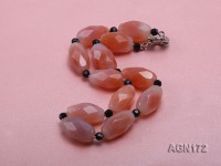 17x30mm red with cream overtone shuttle-type and black round agate necklace
