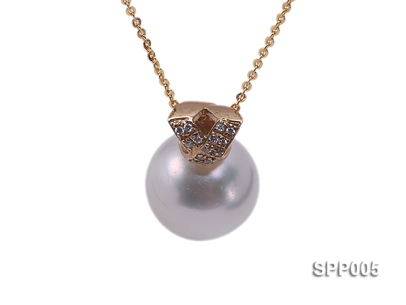 13.2mm white round south seas pearl pendant with 14k yellow gold and zircons