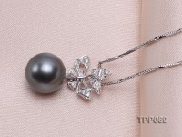 10.5mm Black Tahitian Pearl Pendant with 18k White Gold Bail Dotted with Diamonds