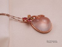 Natural Rose Quartz Pendant Set on a Golden Gilded Bail Dotted with Zircons